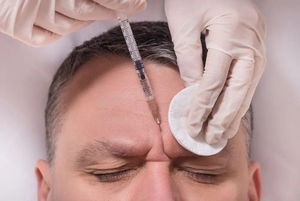 man getting botox